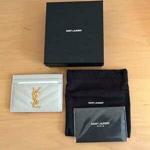 Yves Saint Laurent credit card case. Ivory. New.